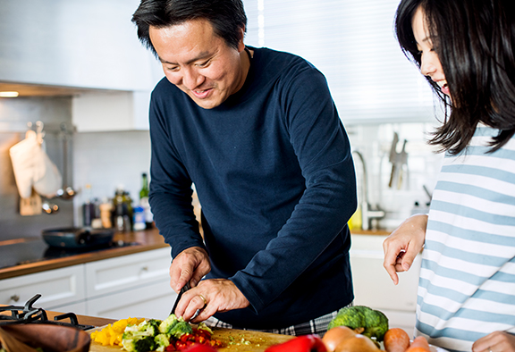 Man cutting vegetables