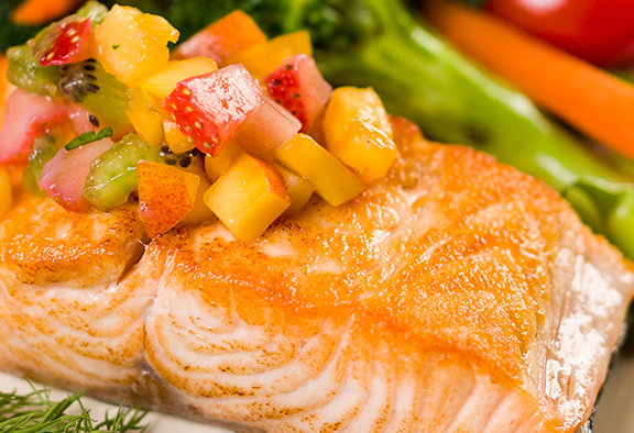 Salmon topped with fruit salsa Salmon topped with fruit salsa