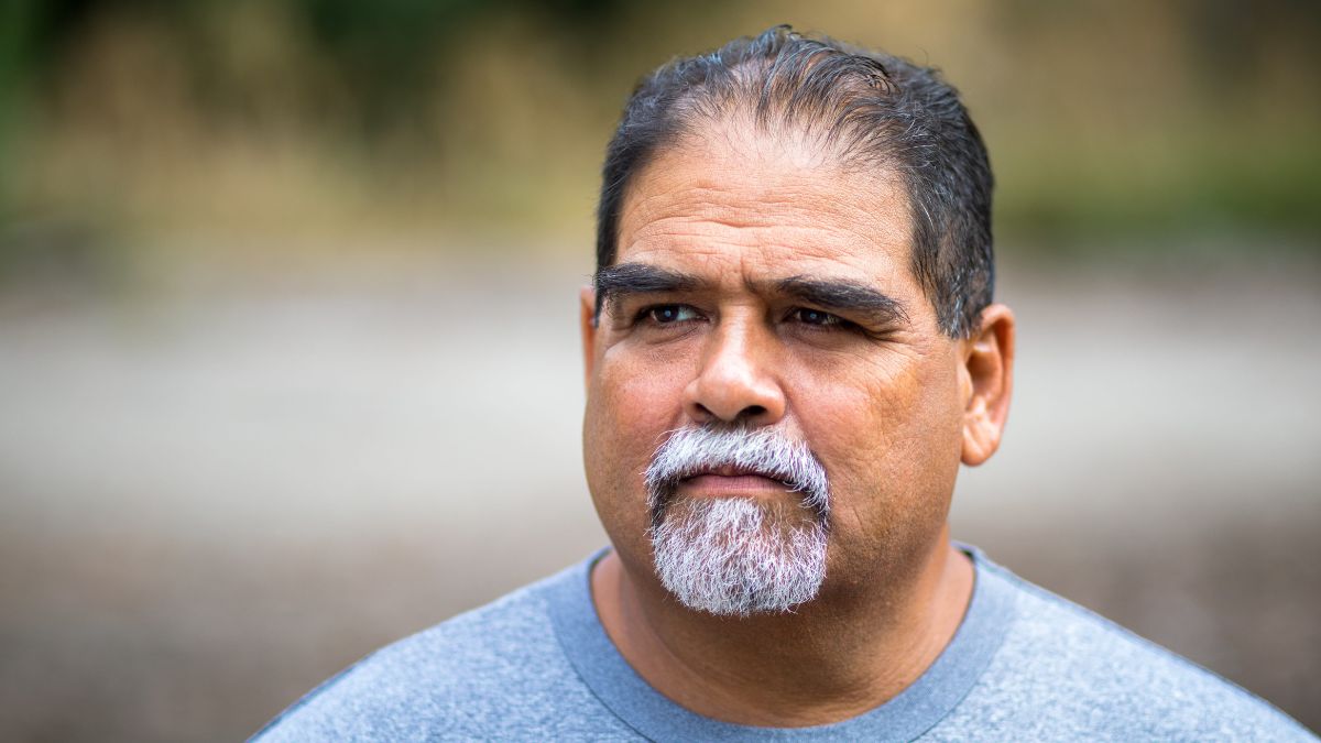Concerned latino diabetic man