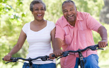 Woman and Man Riding Bike