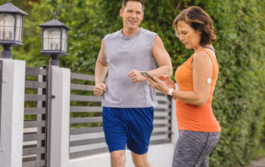 woman-checking-her-cgm-device